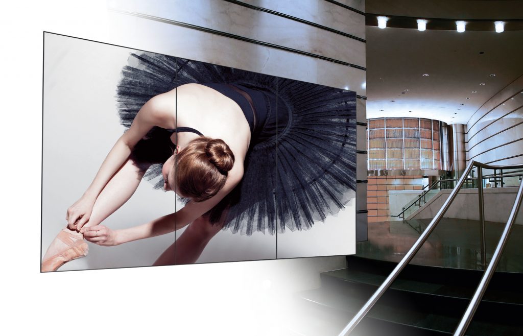 A 3 x 1 video wall display in a library